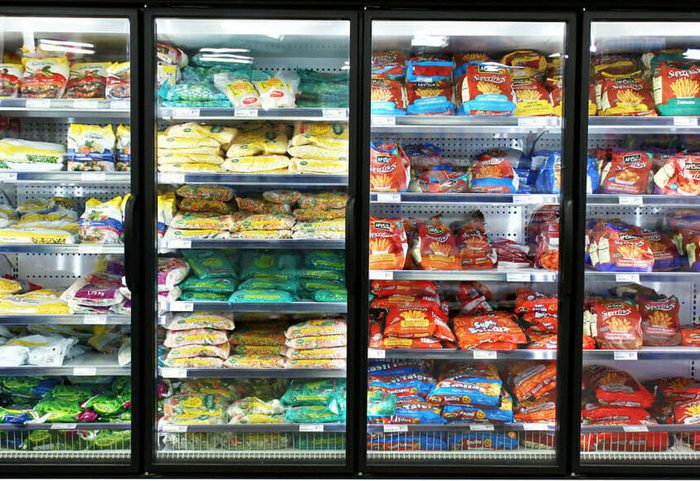 Frozen foods on shelves in a supermarket. In North America, consumption of frozen food has increased in recent years, mostly due to people's busy lifestyle