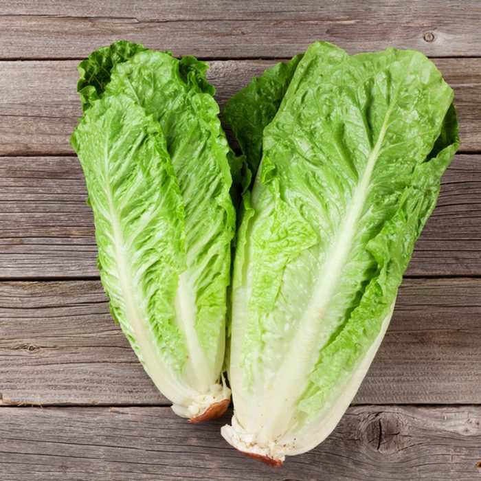 Fresh Romano salad on wooden table.