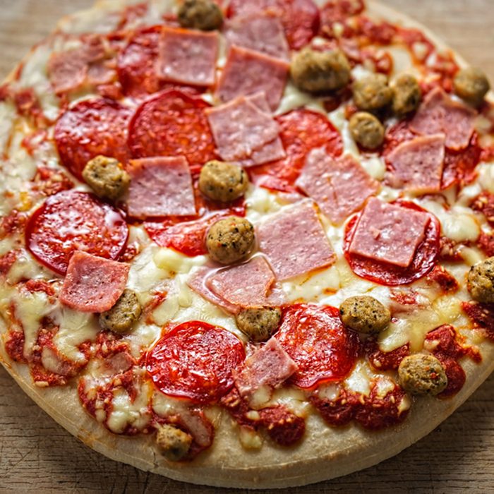 Pan baked meat feast pizza