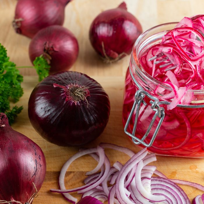 Homemade pickled sliced red onion.