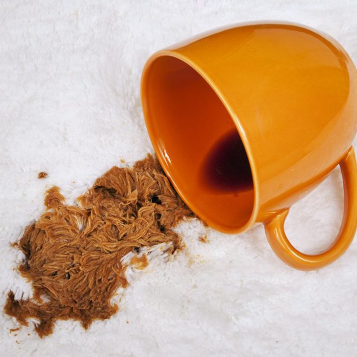 Coffee spill on a white rug