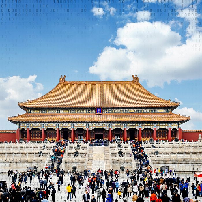 Entrance to the forbidden city in Beijing, China. Lot's of tourists meeting in front of the temple.