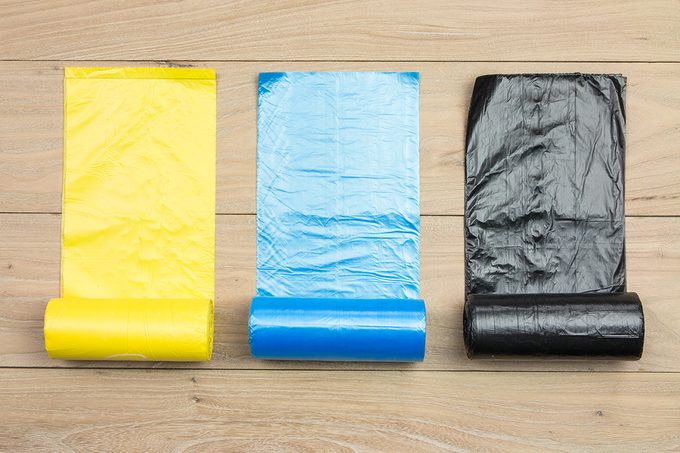 How to Create a Makeshift Garment Bag with a Box of Kitchen Trash Bags
