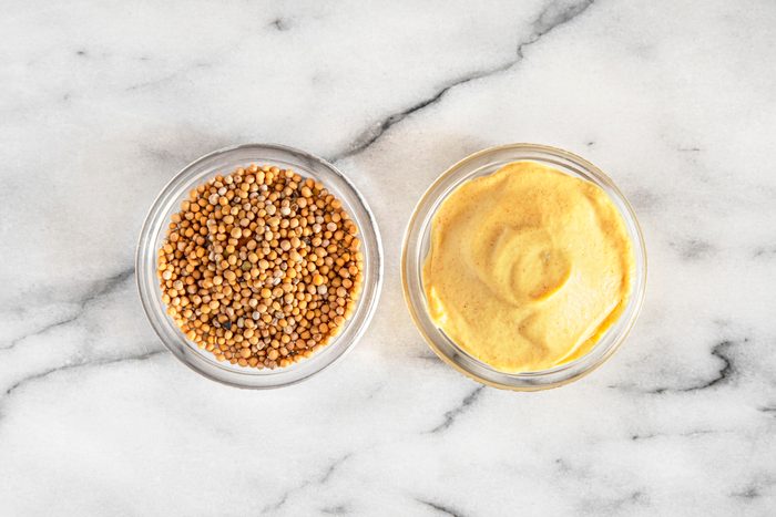 Close-up of mustard seeds and mustard