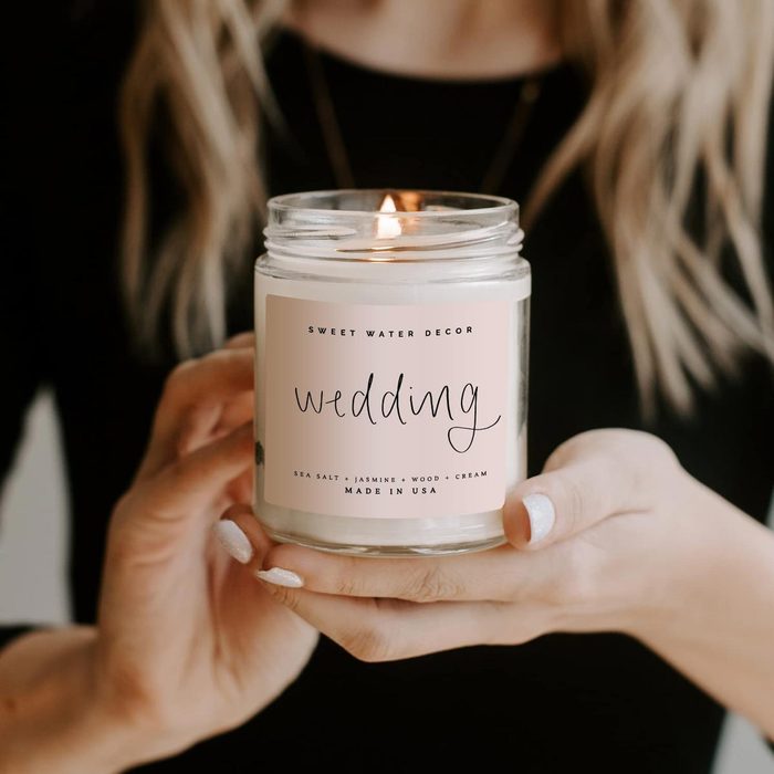 Sweet Water Decor, Wedding Day, Sea Salt, Jasmine, Cream, And Wood Scented Soy Wax Candle Ecomm Via Amazon.com