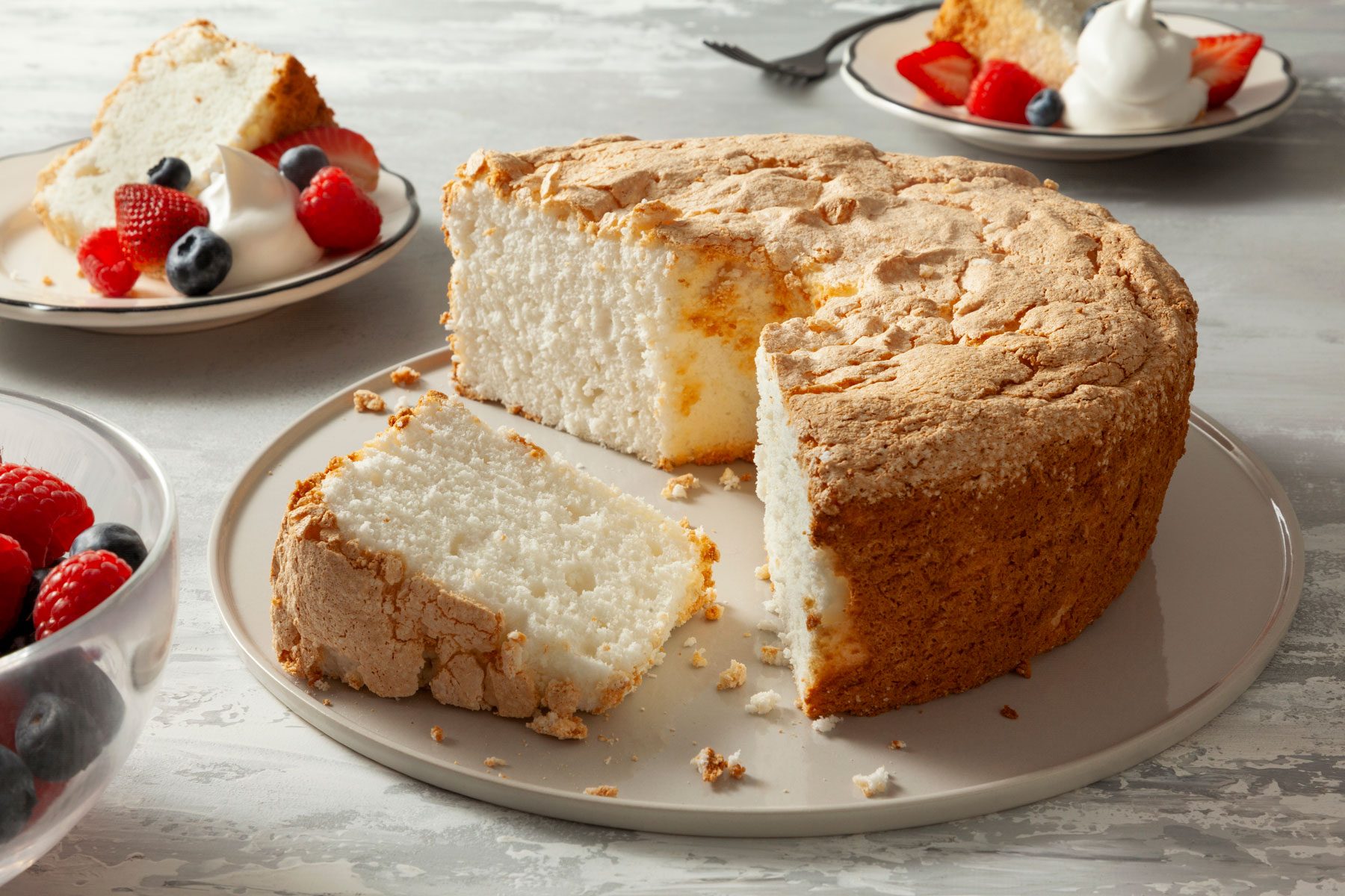 Angel Food Cake served in a plate with berries