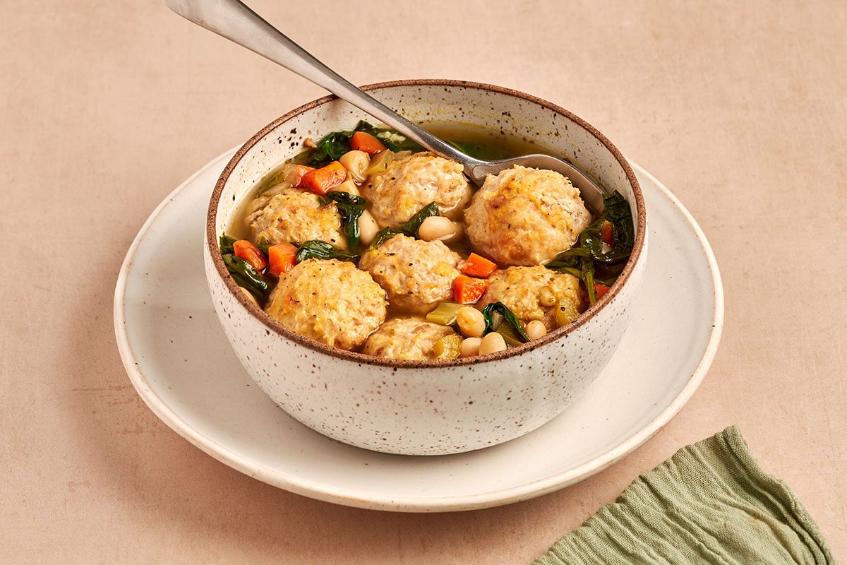 Chicken meatball soup by Taste of Home is a brothy, comforting bowl of vegetables with savory chicken meatballs and tender white beans.