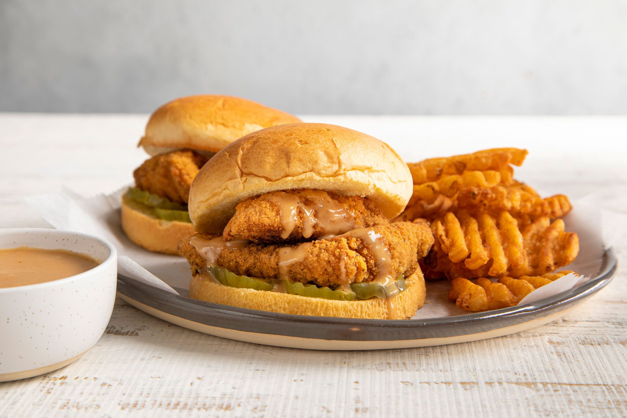 Copycat Chick Fil A Sauce served with burger
