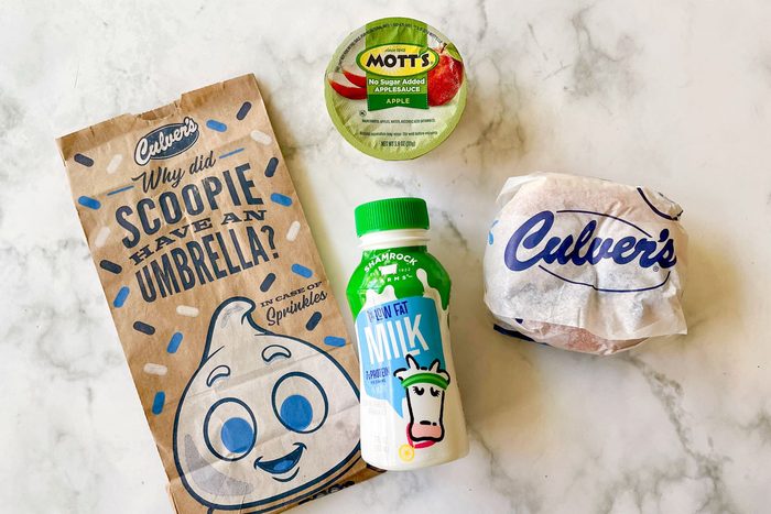 Culver's Fast Food Kids Meal items arranged on marble kitchen counter