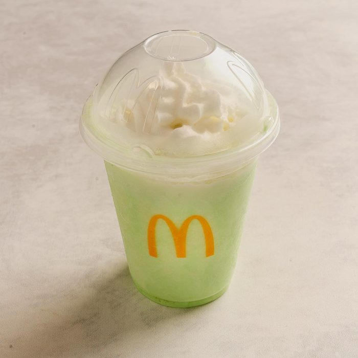 McDonald's shamrock shake on a stone countertop